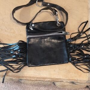Elegant Black Crossbody Bag with Fringe